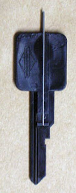 STRATTEC single-sided adapter key. STRATTEC single-sided adapter key.
