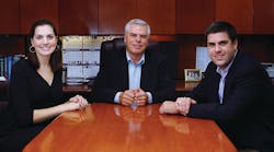 Dan Floeck, H.L. Flake CEO and Managing Partner, flanked by son Jeff Floeck and daughter Leslie Moerer Dan Floeck, H.L. Flake CEO and Managing Partner, flanked by son Jeff Floeck and daughter Leslie Moerer