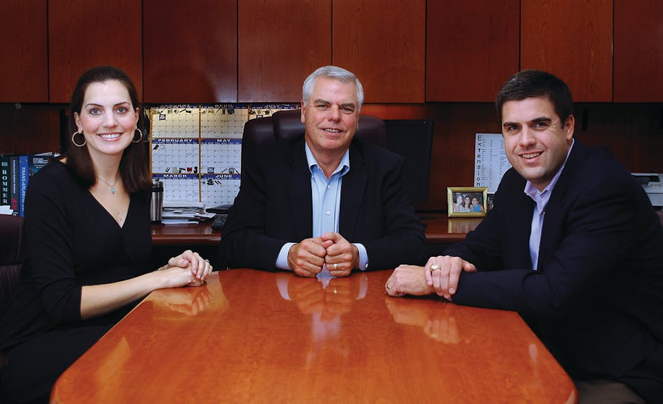 Dan Floeck, H.L. Flake CEO and Managing Partner, flanked by son Jeff Floeck and daughter Leslie Moerer