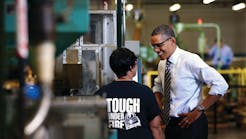 Obama tours factory