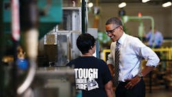 Obama tours factory