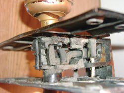 Photo 1. Although no parts were missing, lock unit was in sad shape. Photo 1. Although no parts were missing, lock unit was in sad shape.