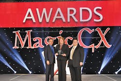 Arecont award presentation: (L-R): Michael Flink, winner Carole Dougan, VP North American Sales at Arecont Vision, Andy Morra