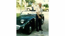 Photo 1: Donald Healey, legendary designer of the Austin Healey line, standing next to Steve Young&rsquo;s 1959 Austin Healey Sprite, which does not have locking doors.