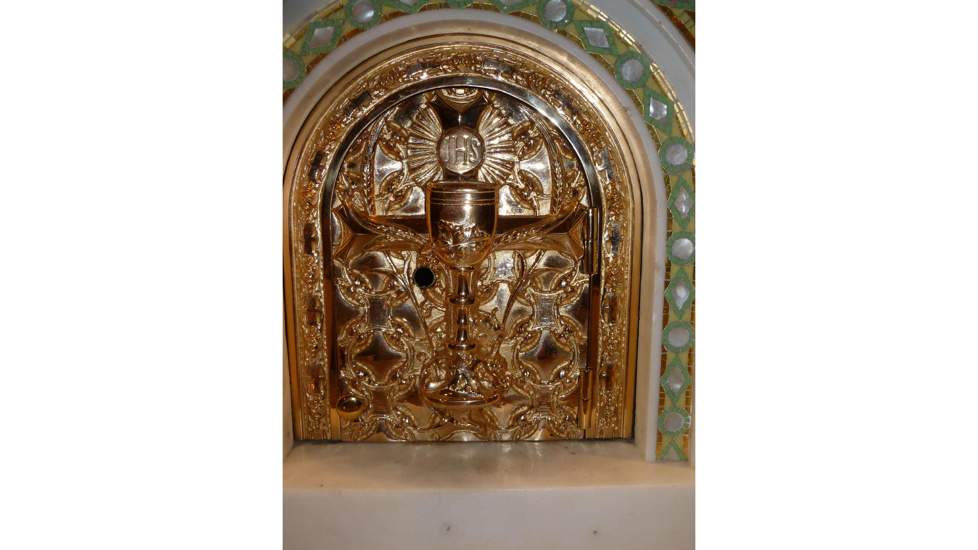 Photo 7. Ornate tabernacle door