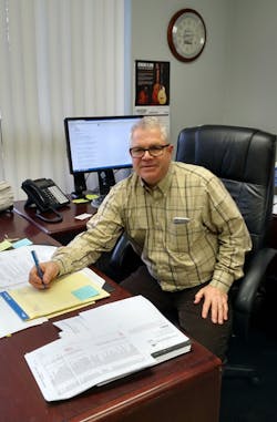 Rob Massard at his desk Rob Massard at his desk