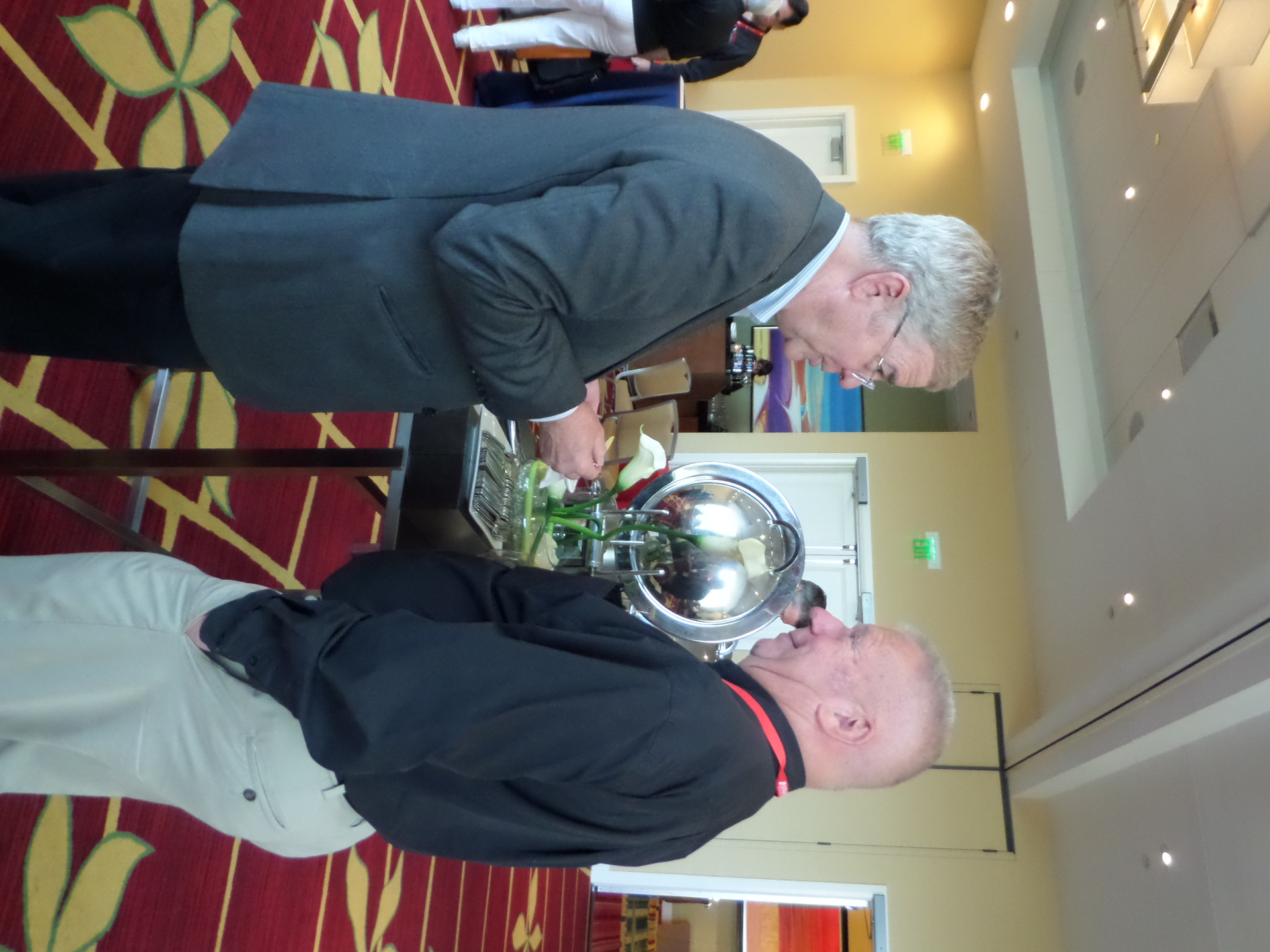 Peter Field of Medeco USA talks with Hans Mejlshede of Copenhagen