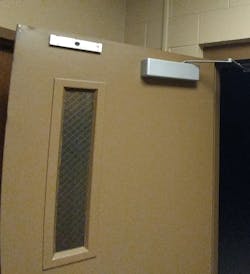 The EML itself most often sits atop the door opposite the hinge. The main lock body usually mounts to the stationary door frame and the “armature”-- in the form of a flat metal plate--fastens to the opposing surface of a movable door. The EML itself most often sits atop the door opposite the hinge. The main lock body usually mounts to the stationary door frame and the “armature”-- in the form of a flat metal plate--fastens to the opposing surface of a movable door.