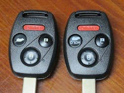 Photo 1. Photo-1: Two nearly identical Honda Pilot IRKs. The key on the left releases the rear glass in the hatch, while the key on the right operates the power opening and closing of the entire hatch.