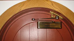 Arched door closer application