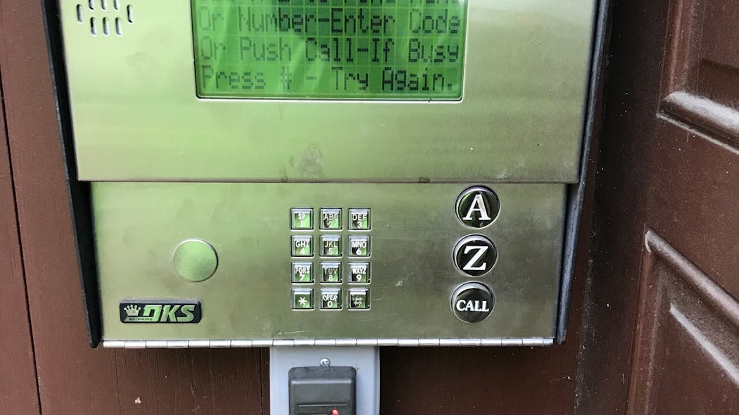 A Doorking access control card reader added to a cellular-based intercom with directory