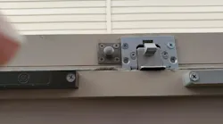 Steve Norch, President of Bierly-Litman Lock & Door, Canton, Ohio, installed an electric latch as part of a mechanical panic bar.