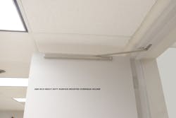 An ABH 9010 heavy-duty surface-mounted overhead door holder An ABH 9010 heavy-duty surface-mounted overhead door holder