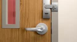 NFPA 101 now allows auxiliary hardware that requires a second releasing operation on existing classroom doors if the stated requirements are met. The I-Codes require classroom doors to unlatch with one releasing operation.