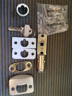 Image 1: The Kwikset Halifax entry lever parts, with a SmartKey SC1 keyway