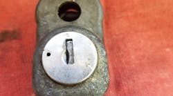 Image 3: The Corvette spare-tire lock removed from the assembly Image 3: The Corvette spare-tire lock removed from the assembly