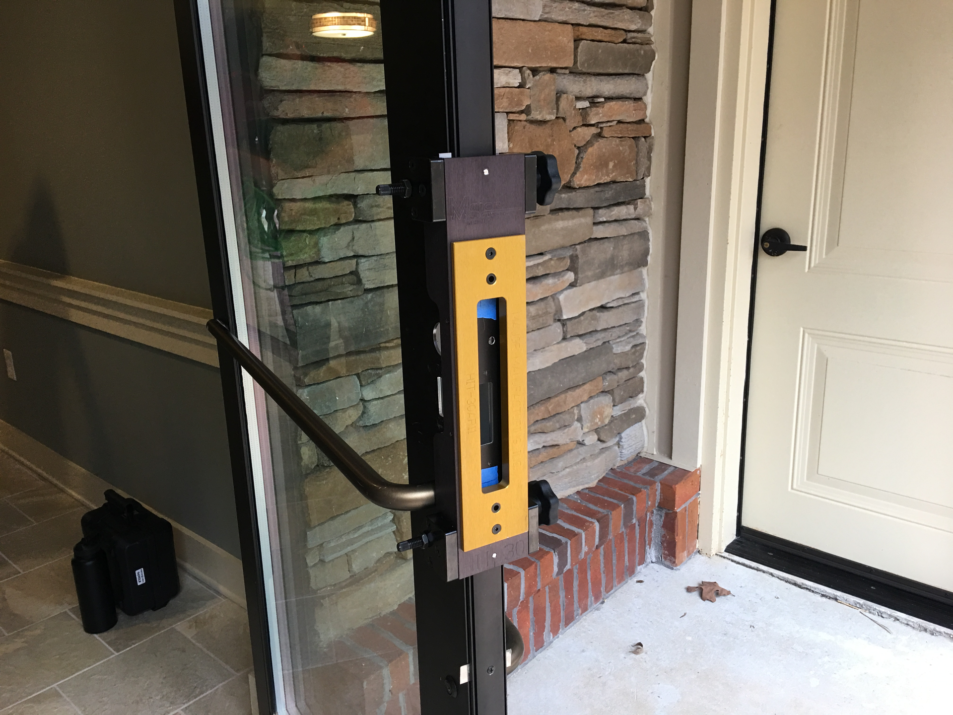 A jig can make working with aluminum doors so much easier.