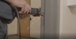 Image 1: Cutting the frame for the strike Image 1: Cutting the frame for the strike