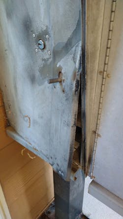 Back view, postal lock and bottom corner with pry marks Back view, postal lock and bottom corner with pry marks