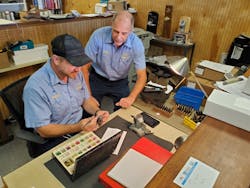 Cliff Shafer with new technician George Cliff Shafer with new technician George