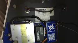 A PAC-BLU ACCESS-Mini with a spring-loaded cabinet lock and a tri-color button wired into it for an ATM