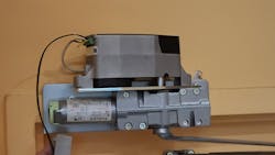 Image 6: The terminal, top left, is plugged back into the 6400 COMPACT. Image 6: The terminal, top left, is plugged back into the 6400 COMPACT.