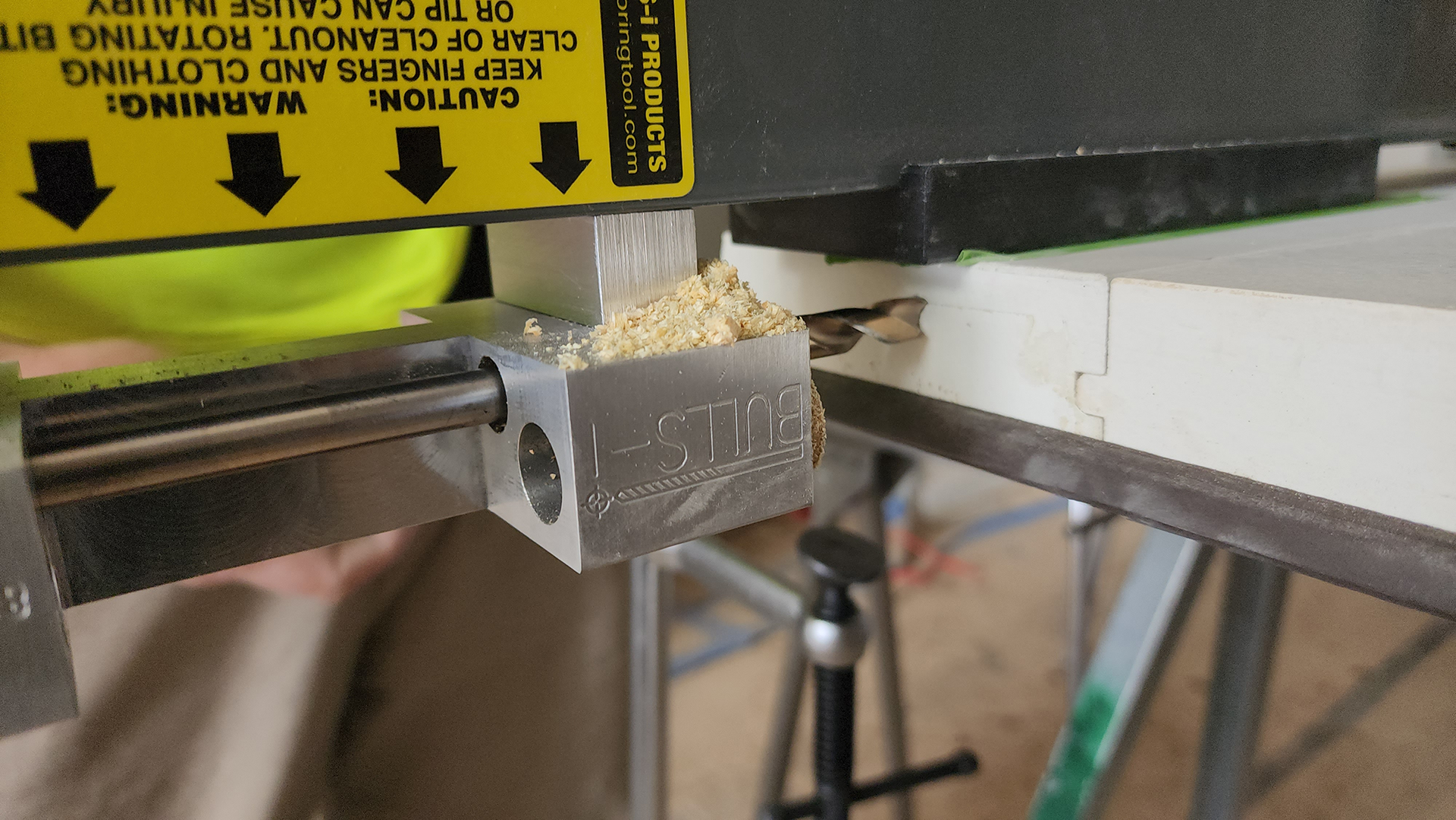 Photo 1. Bulls-I in action, drilling door for electronic access control installation