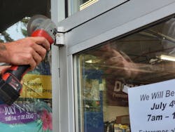 Photo 7. Cut top hinge with angle grinder Photo 7. Cut top hinge with angle grinder