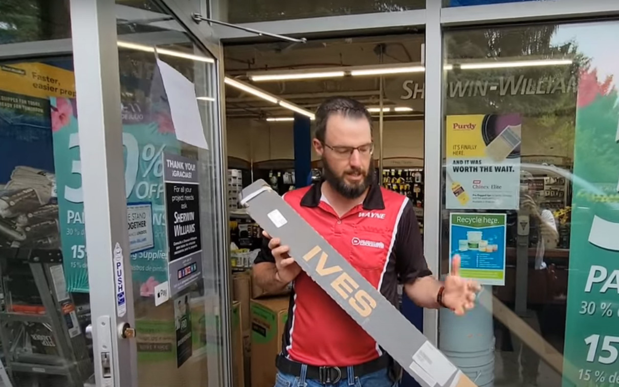 Photo 1. Sagging door needs geared continuous hinge