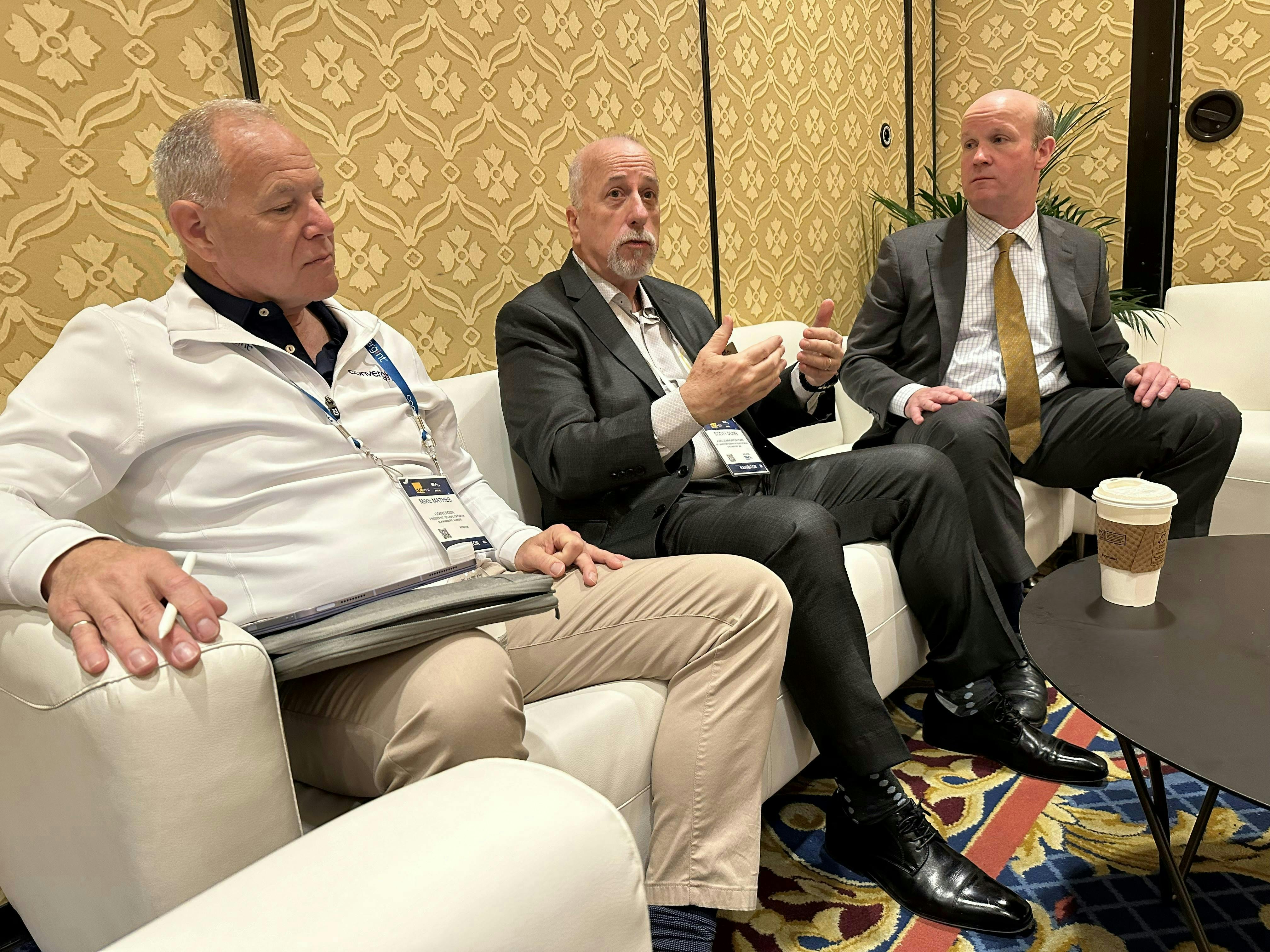 SIA Chairman Scott Dunn (center), SIA Executive Committee member Mike Mathes (left) and SIA CEO Don Erickson discuss the organization&rsquo;s most recent market index at ISC West 2024.