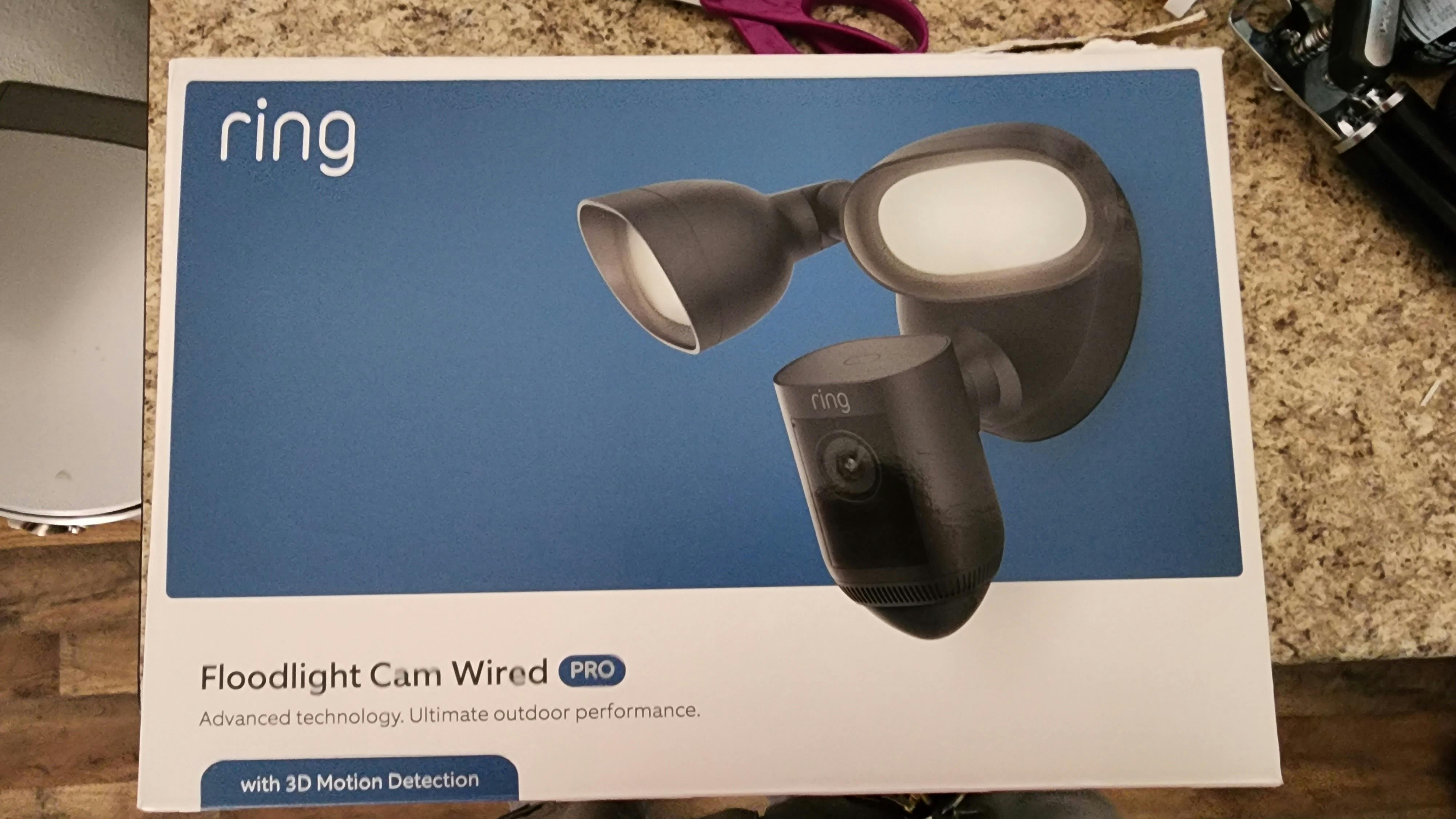 Right wired floodlight camera will replace existing light fixture.