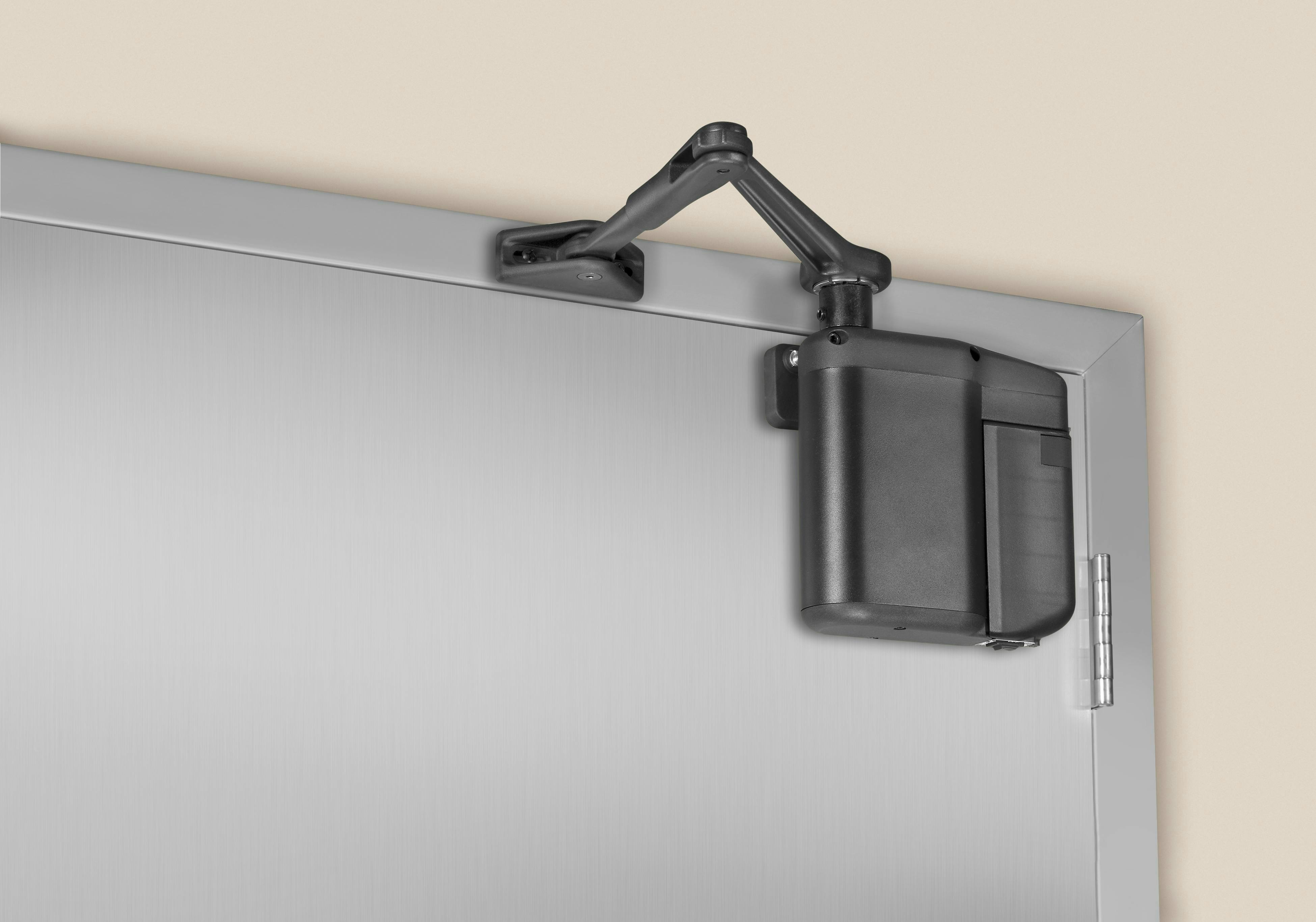 Door energy harvesting technology is used in commercial low-energy power door operator products like this Norton 5800 for a cost-effective solution that offers power-saving potential and ease of installation.