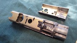 Kwikset deadlatch with cover removed Kwikset deadlatch with cover removed