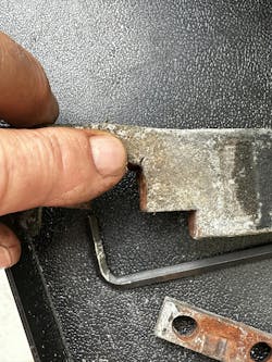 Bracket removed. You can see the hairline crack that could result in a door falling on someone if it broke. Bracket removed. You can see the hairline crack that could result in a door falling on someone if it broke.