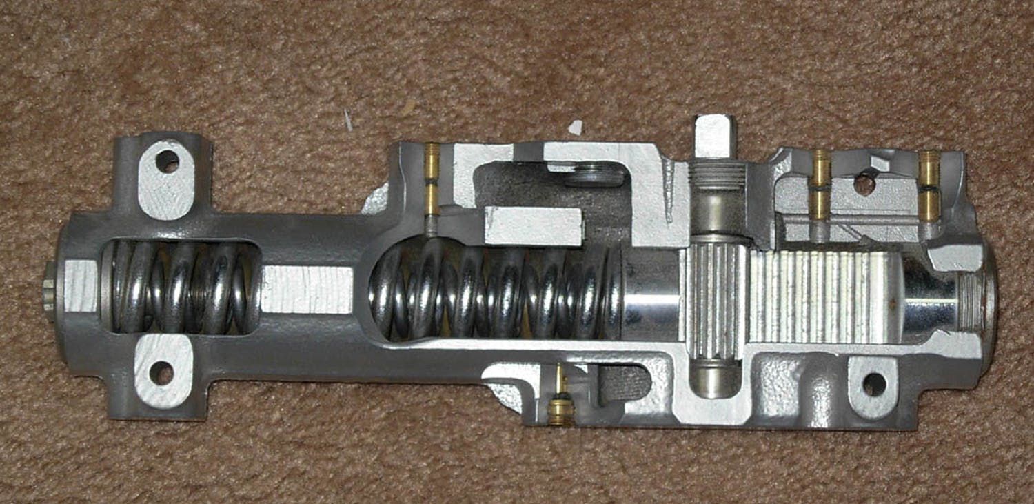 Cutaway view, surface=mounted rack and pinion door closer