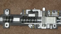 Cutaway view, surface=mounted rack and pinion door closer