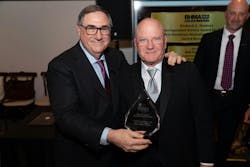 Robert Strong (right) accepts award from Ralph Vasami, BHMA Executive Director Robert Strong (right) accepts award from Ralph Vasami, BHMA Executive Director
