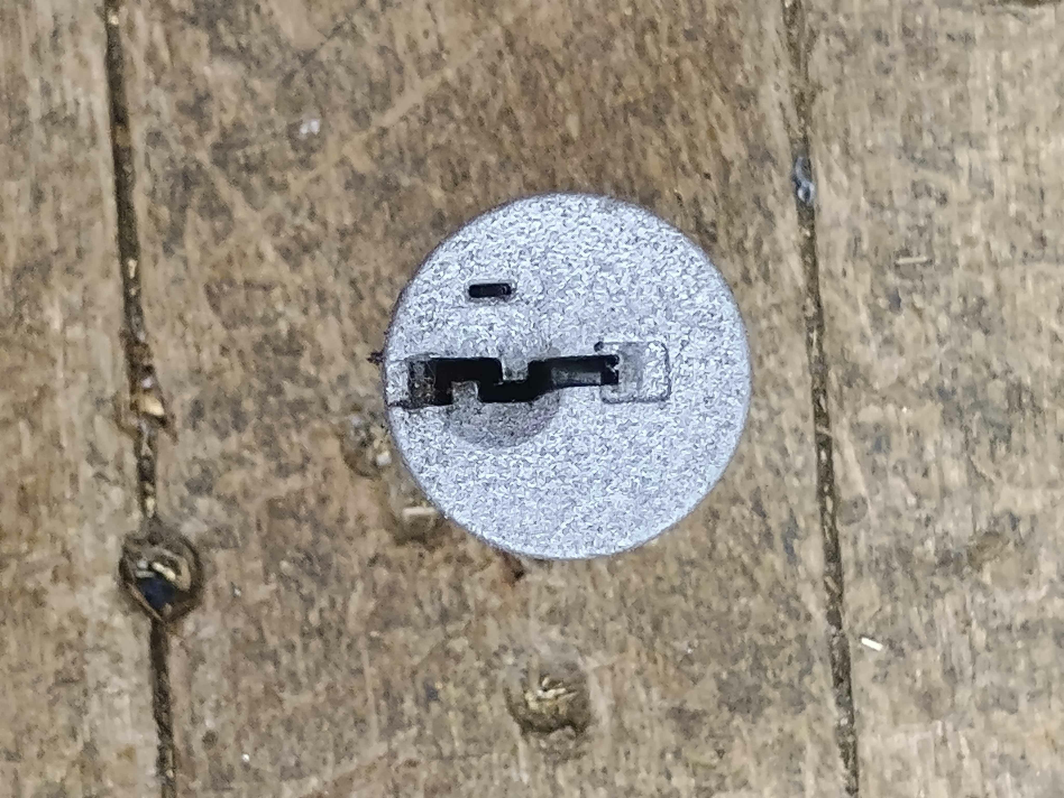 Figure 1. SmartKey hole shown at top
