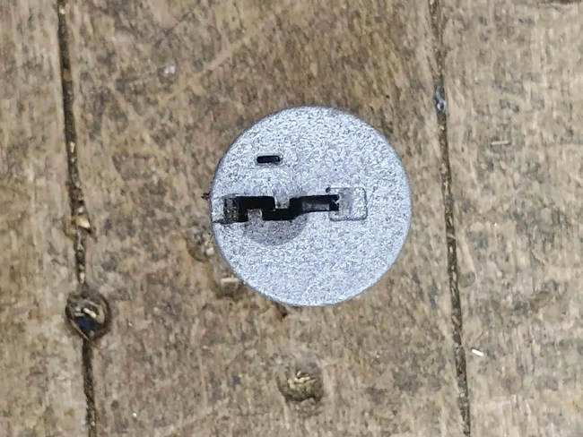 Figure 1. SmartKey hole shown at top