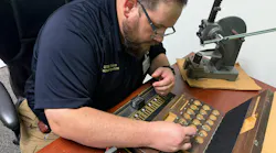Pinning is one of the many responsibilities at the UTMB locksmith work area.
