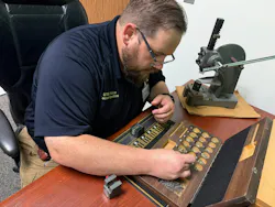 Pinning is one of the many responsibilities at the UTMB locksmith work area.